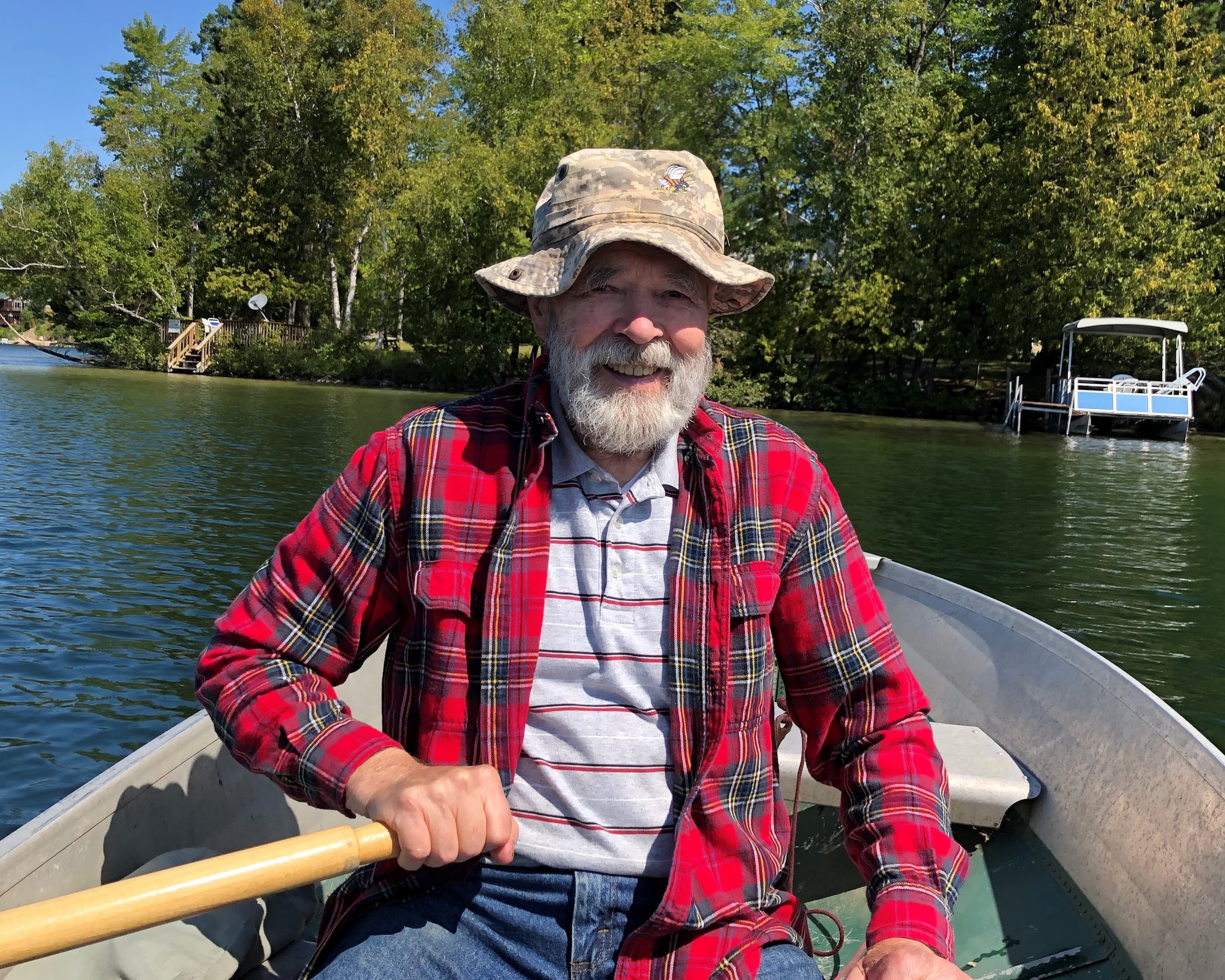 CLMP Volunteer on row boat